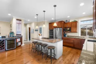 The built-in cabinetry to the left includes a wine fridge, and lots of storage.