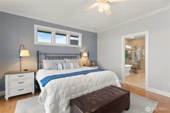 The primary bath and huge walk in closet is through the doorway in this photo.