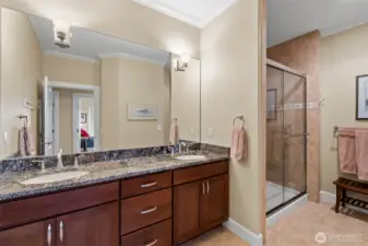 This is the 3/4 bath directly across the hall from guest bedrooms 3 & 4, featuring dual sinks and a walk in shower.