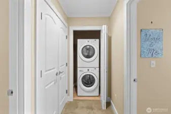No need to haul laundry up the stairs, the lower level has its own full-sized stackable washer & dryer, included in the sale.