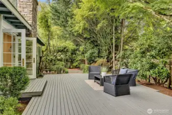 Features include expansive deck for evening BBQs, surrounded by beautiful & mature plants throughout.