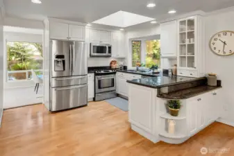 Enjoy the chef’s gourmet kitchen with a skylight.