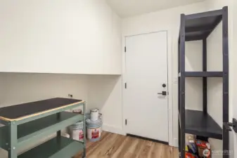 Utility closet and separate entrance off of lower level bedroom