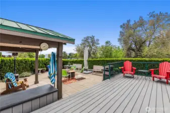 The big deck leading to the front door provides vistas in every direction. Let's step inside the home for a look...