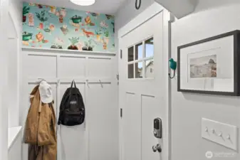 This darling wallpaper is peel & stick, for an easy change. The entryway is like a mini mudroom, and so functional!