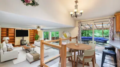 This view showcases how the kitchen and family room remain separate but connected. **Virtually Staged**