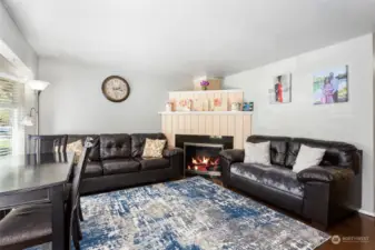 Unit 2 living room with fireplace