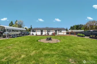 Firepit and raised garden areas