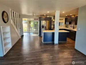Looking from living room to kitchen and sun rom
