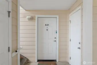 Front door entrance & Storage locker for you toys.