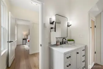 Beautifully updated bathroom with sleek fixtures, contemporary finishes, and a fresh, modern feel