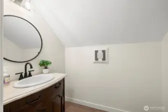 Convenient upstairs half bath- perfect for everyday functionality or guests