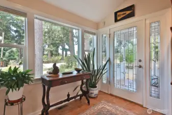 Tiled entry area features a large coat closet.