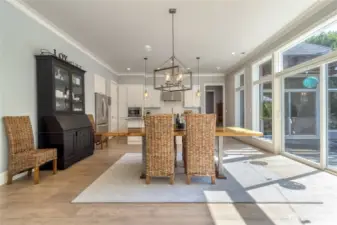 Dining & Kitchen with access to backyard & patio