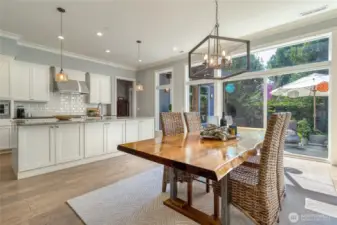Dining room & Kitchen with view of back yard