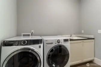 Dryer & New washer stay with the home