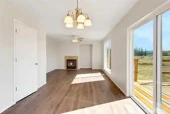 Looking towards family room and dining area.  Half bath to the left