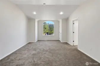 Primary with deck off front of home and full primary bath