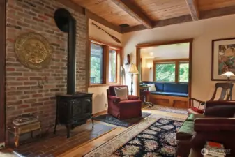 Freestanding propane stove will keep you toasty and warm on those chilly winter nights. The Reading Nook built-in bench can also be a bed.