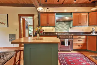 Let's go see the Family Room (could also be a main level Primary) and Full Bath through the doorway straight ahead.