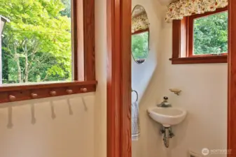 Perfect spot for a half bath, right off the mud room where you can leave your boots and coats. We never loose the thread of beautiful craftsmanship in this home, even in the laundry room!