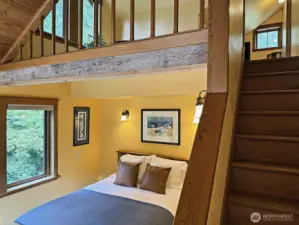 Up the stairs to a loft area and office with additional storage space.