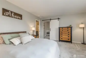Sliding barn door leads to the attached office/den/nursery!