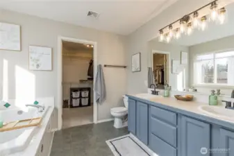Light-filled 5-piece primary bathroom