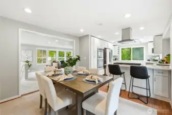 Open Dining and Kitchen Layout with Island Seating and View to Living Room