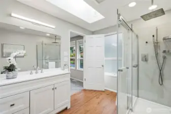 Updated Primary Bathroom with Glass Walk In Shower and Modern Vanity