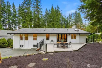 Rear Exterior of Forest Park Everett Home with Oversized Entertaining Deck