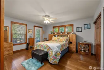 Primary bedroom on main floor with private balcony