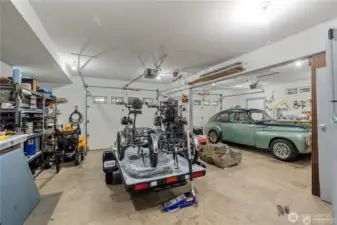 There's an accordion door that can close to separate the two main garage bays