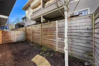 This secure, fully fenced back yard is yours to enjoy. Could add pavers, a patio/barbeque or just run space for your pup.