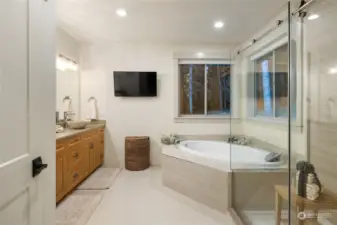Gorgeous primary bathroom w/separate tub & shower.