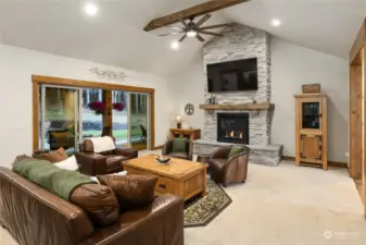 Beautiful floor to ceiling fireplace...time for a game or your favorite movie!
