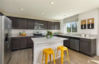 Picture of model home, kitchen not actual home.