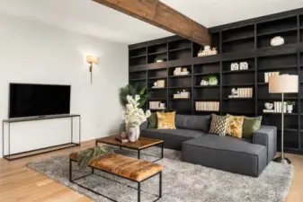 Expansive custom casework bookcase in second living room.