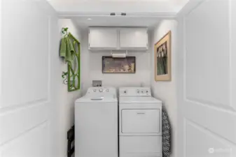 Bright laundry area. Washer and dryer are included in the sale.