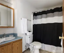 Full bathroom with tub/shower combo