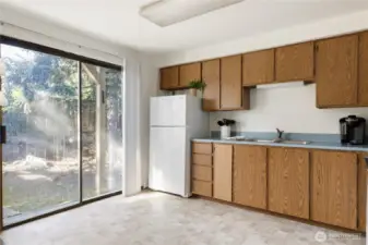 Large Sliding glass door for outside backyard access.