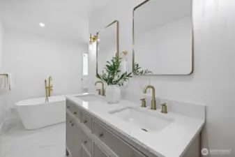 Fully remodeled en suite with dual vanity.