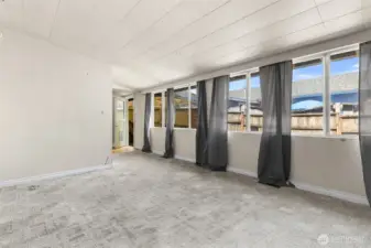 Lots of windows in the family room, and access to the back yard