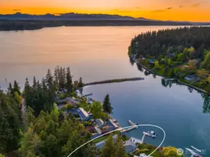 90+- feet of waterfront with private dock on protected Fletcher Bay