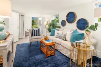 The lower level opens to a stylish bonus living space with fresh finishes, perfect for a media room, guest lounge, or playroom.