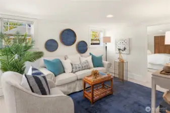 Bright windows and crisp finishes keep this lower-level lounge airy and inviting, with flexible space to suit your lifestyle.
