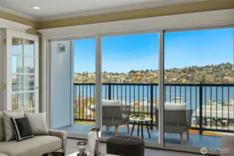 Private balcony with front-row Lake Union and Gas Works Park views.