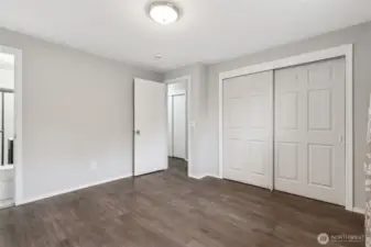 Another view of primary bedroom