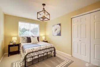 This bedroom overlooks the street front.