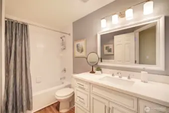An additional full sized bath, also remodeled, is featured upstairs.